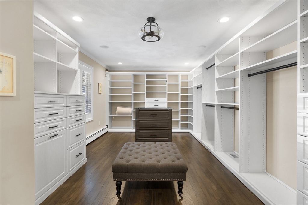 71 Porter Road Boxford, MA 01921 - Photo 15 of 37 a view of walk in closet with clothes and shoes
