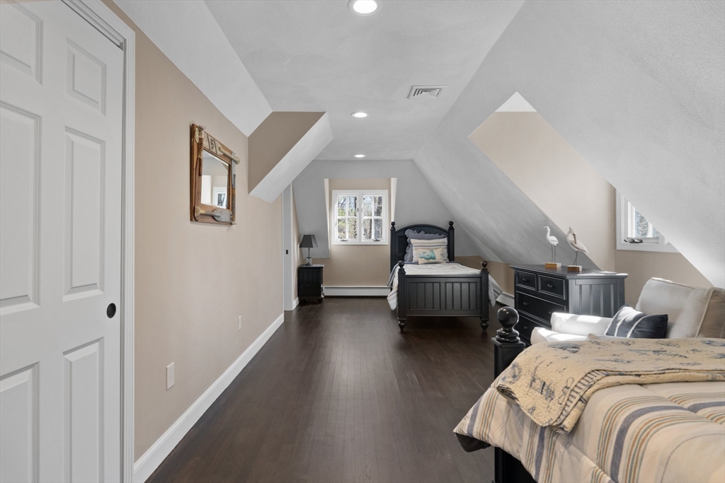 71 Porter Road Boxford, MA 01921 - Photo 23 of 37 a bedroom with a bed and a couch