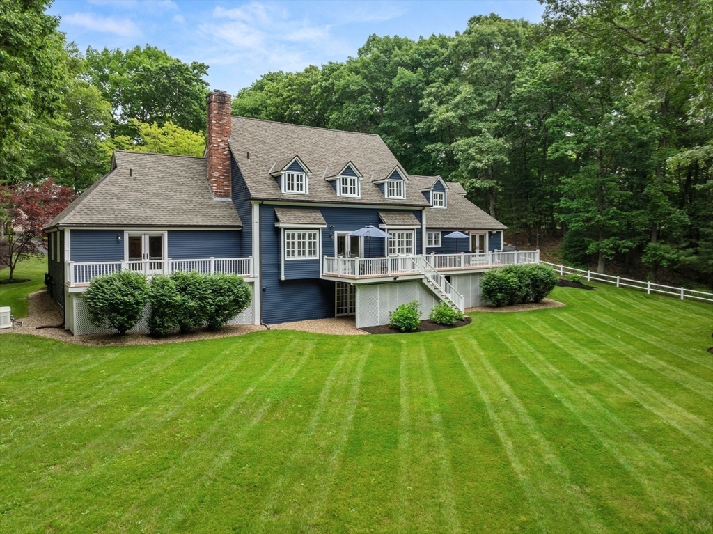 71 Porter Road Boxford, MA 01921 - Photo 29 of 37 a view of a house with a big yard plants and large trees