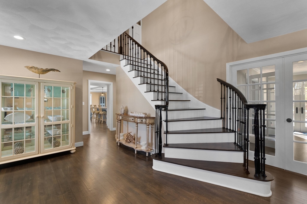 71 Porter Road Boxford, MA 01921 - Photo 3 of 37 a view of front door with hallway and wooden floor