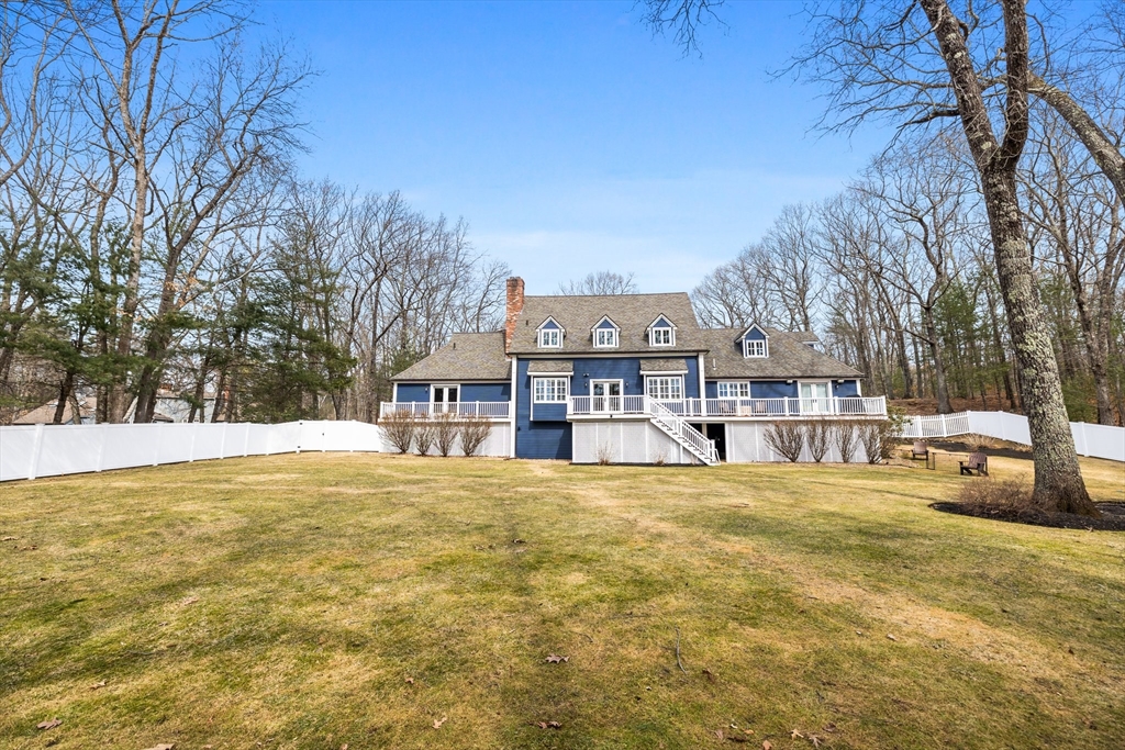 71 Porter Road Boxford, MA 01921 - Photo 32 of 37 a view of a house with snow on the road