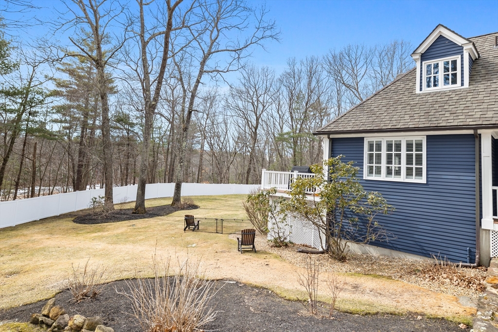 71 Porter Road Boxford, MA 01921 - Photo 33 of 37 a view of a house with snow in the backyard