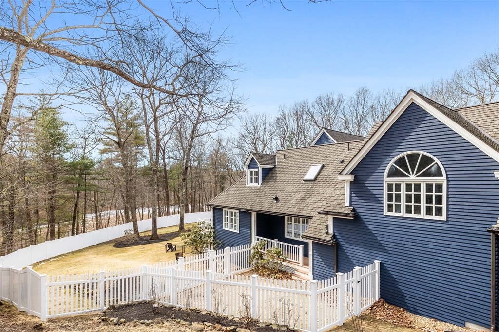 71 Porter Road Boxford, MA 01921 - Photo 35 of 37 a view of a house with backyard and trees