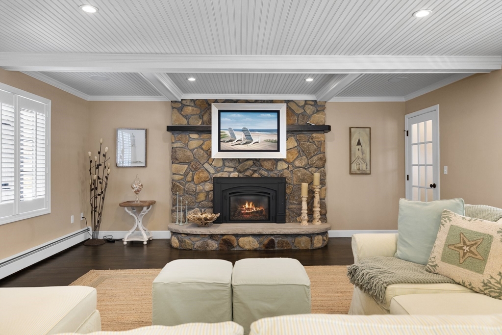 71 Porter Road Boxford, MA 01921 - Photo 6 of 37 a living room with furniture and a fireplace