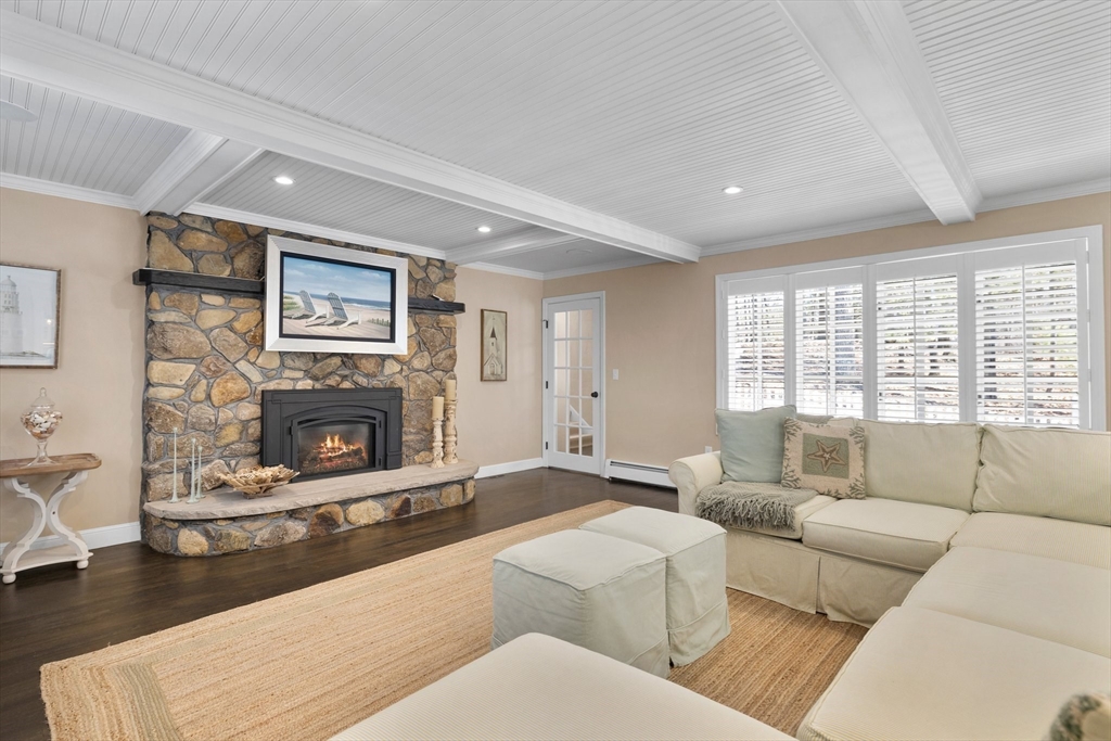 71 Porter Road Boxford, MA 01921 - Photo 7 of 37 a living room with furniture and a fireplace
