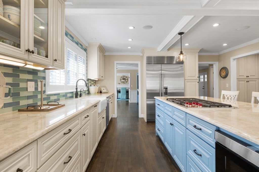 71 Porter Road Boxford, MA 01921 - Photo 9 of 37 a large kitchen with stainless steel appliances granite countertop a lot of counter space and a wooden floors