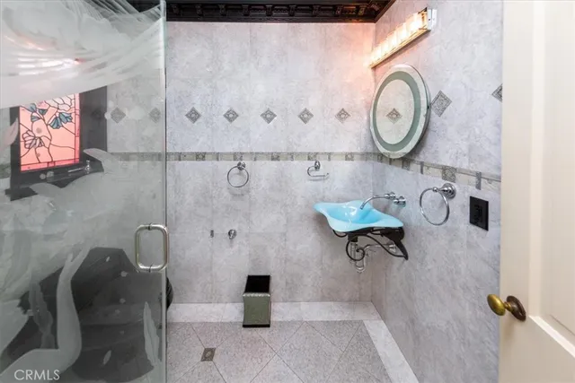 a bathroom with a tub and a shower
