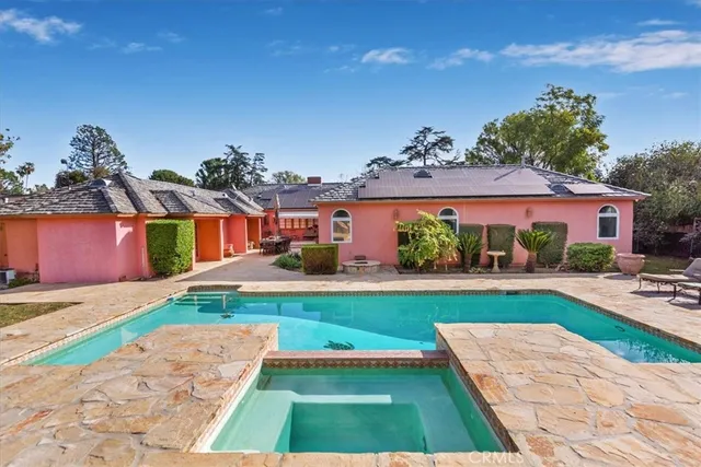 a view of a backyard with a garden and plants