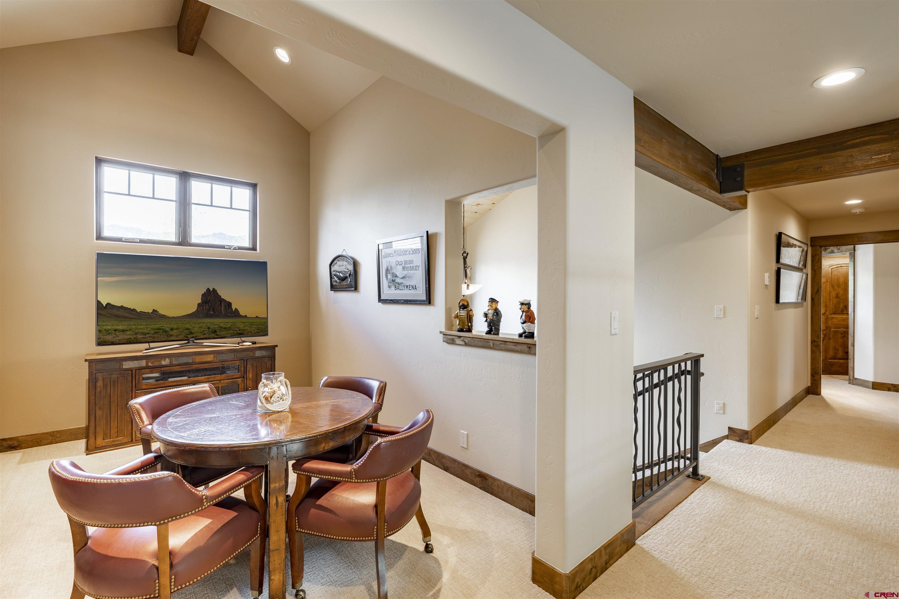 610 Red Rock Road Durango, CO 81301 - Photo 25 of 35 a view of a dining room with furniture