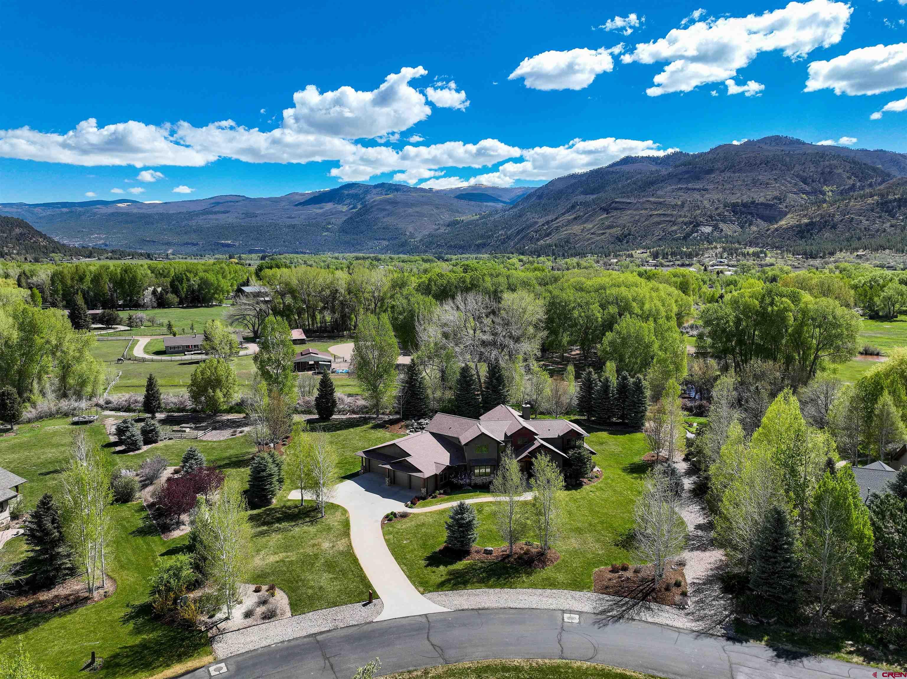 610 Red Rock Road Durango, CO 81301 - Photo 5 of 35 a view of a lake with a mountain