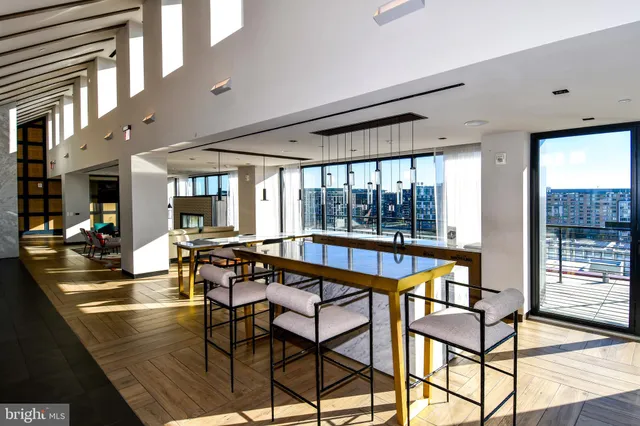 a view of a living room and dining room
