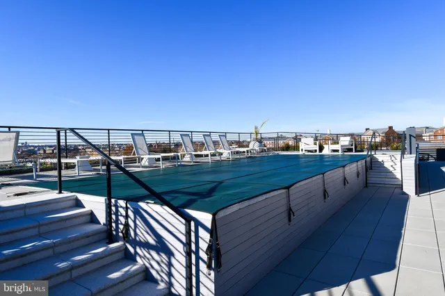 a view of parking garage with cars