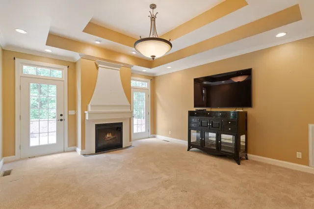 a kitchen with granite countertop a sink and cabinets