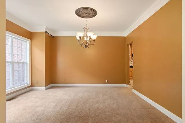 a bath tub sitting next to a shower