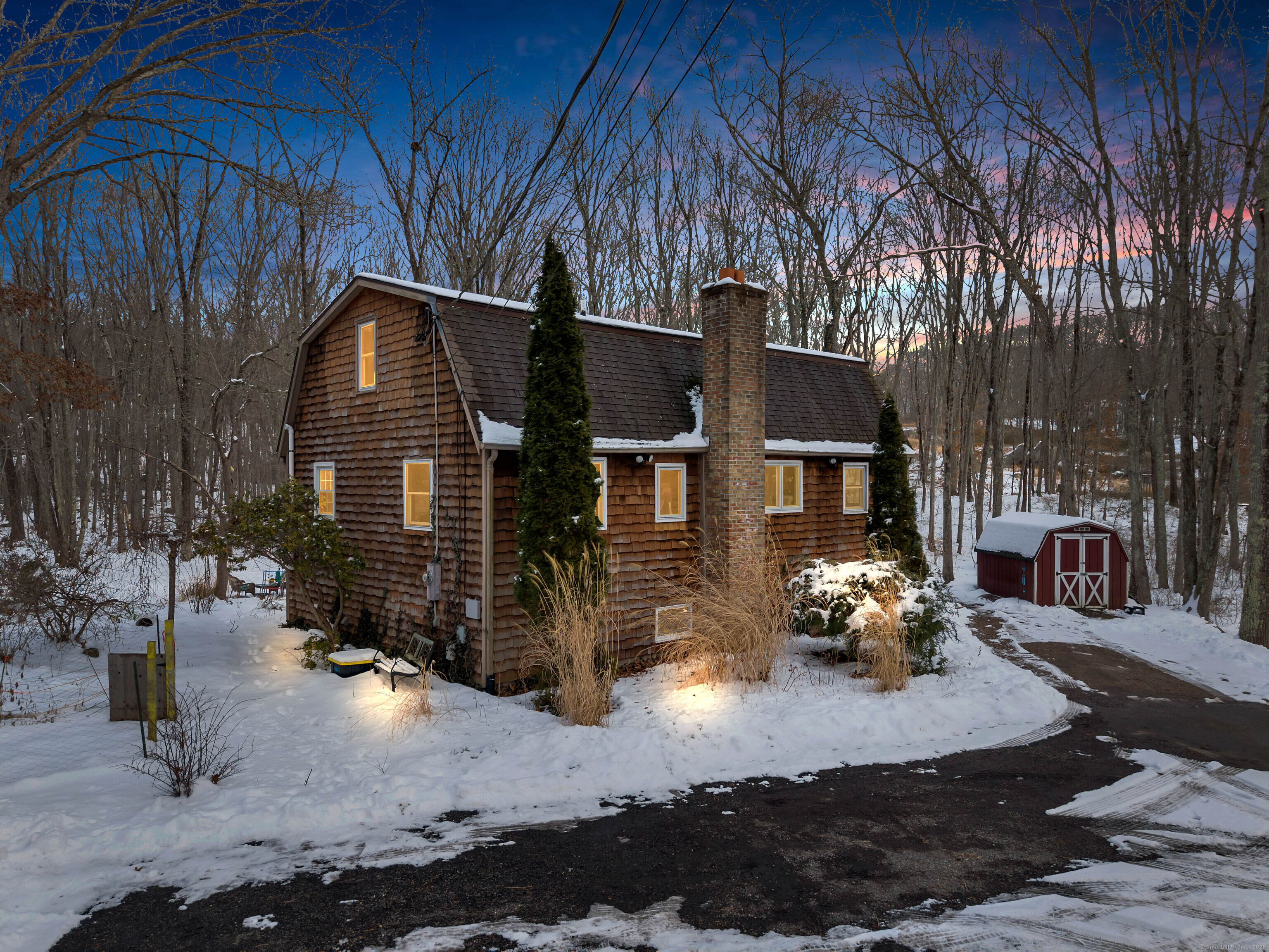 94 Whalehead Road Ledyard, CT 06335 - Photo 1 of 1 a view of a house with a yard siting area and garden