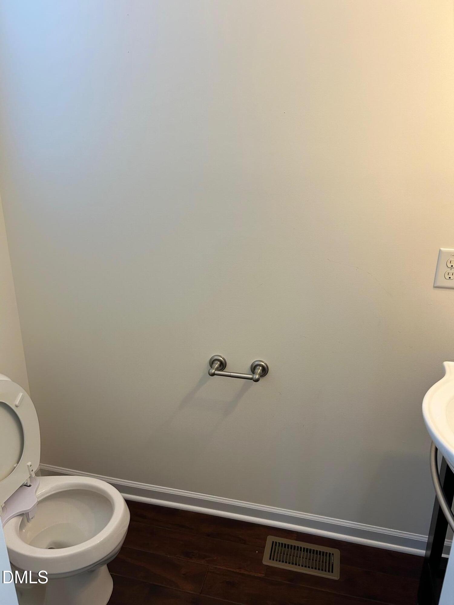 4110 Sykes Street Cary, NC 27519 - Photo 15 of 29 a view of a bathroom with toilet