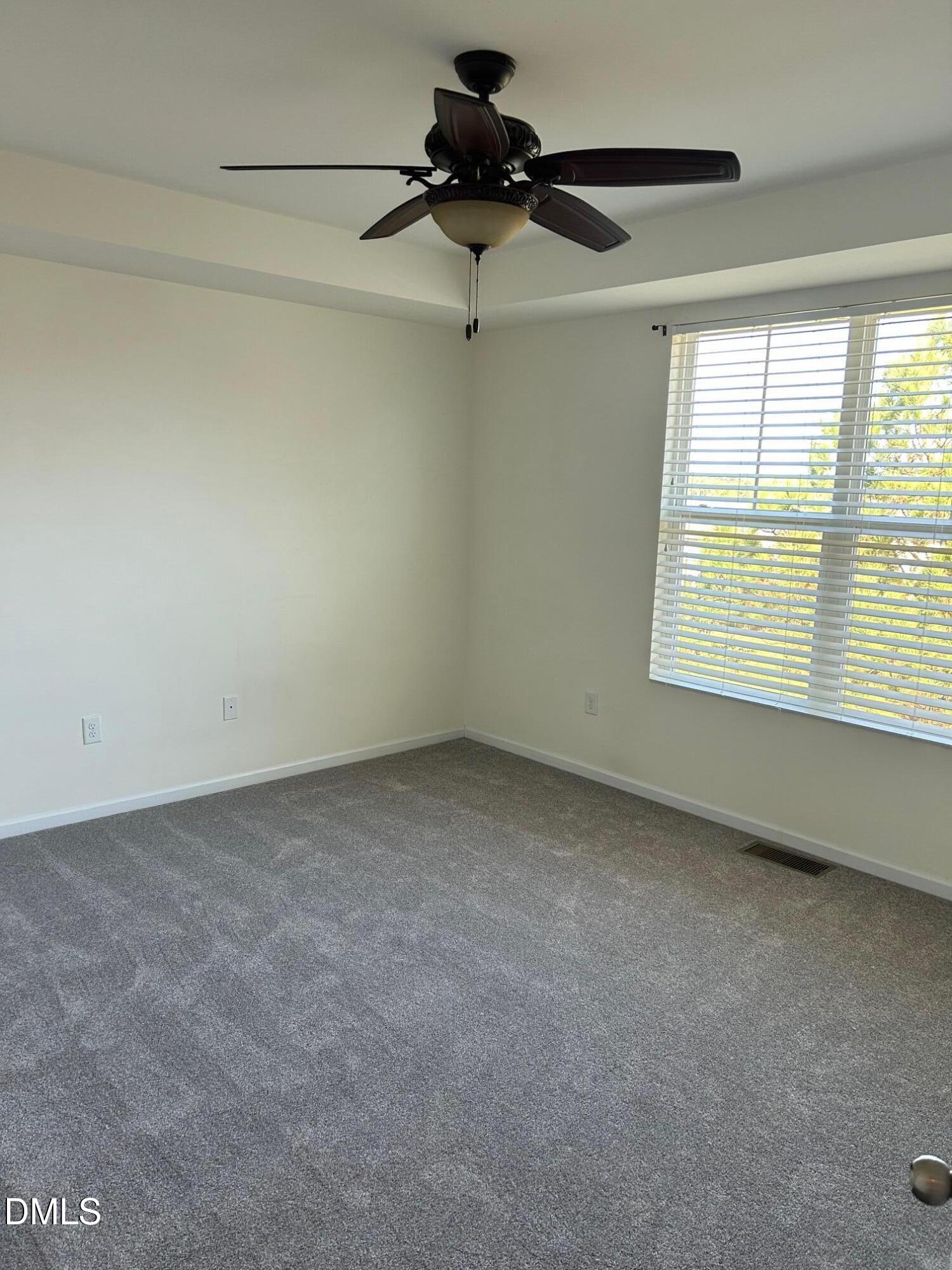 4110 Sykes Street Cary, NC 27519 - Photo 17 of 29 a view of an empty room with a window