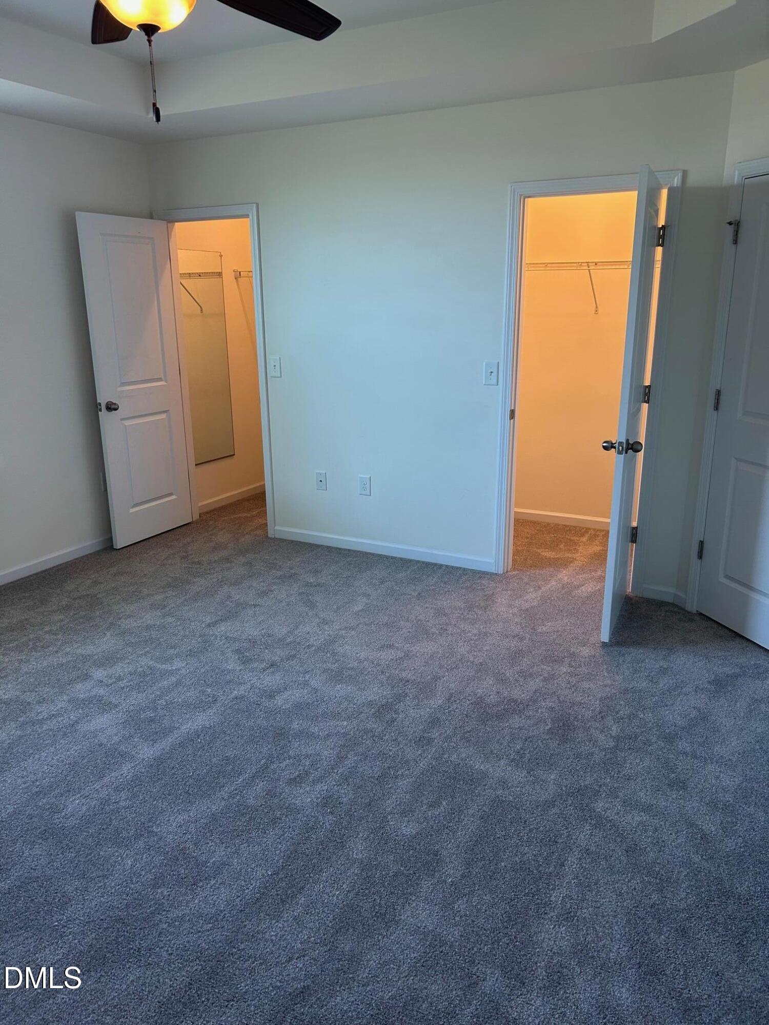 4110 Sykes Street Cary, NC 27519 - Photo 20 of 29 an empty room with a window and a ceiling fan