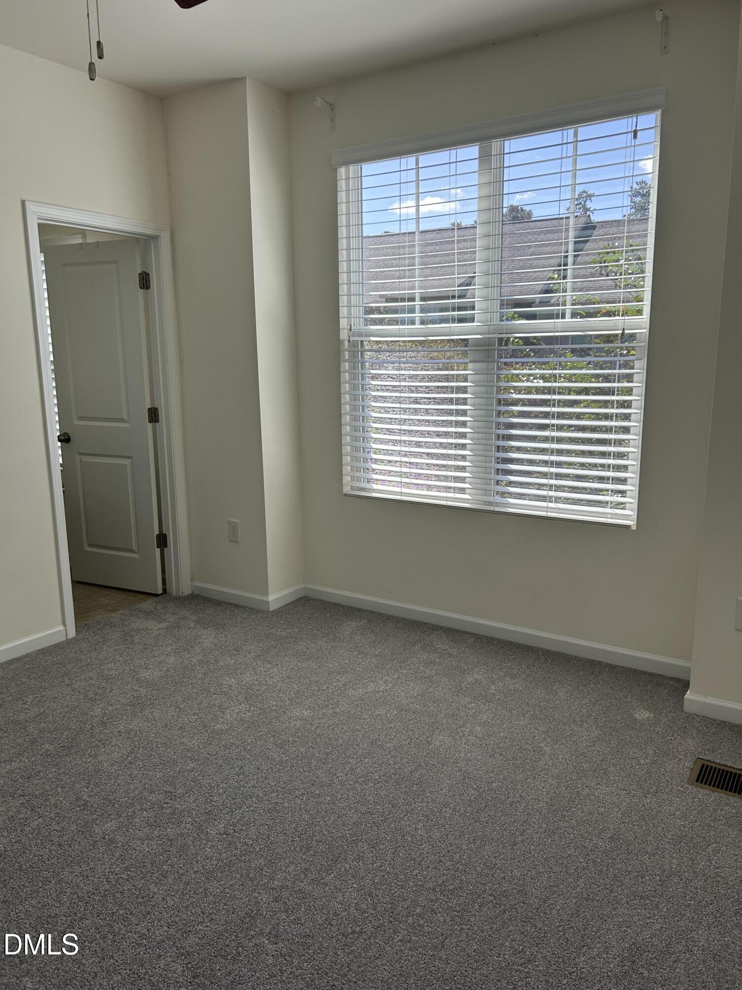 4110 Sykes Street Cary, NC 27519 - Photo 27 of 29 a view of an empty room with a window