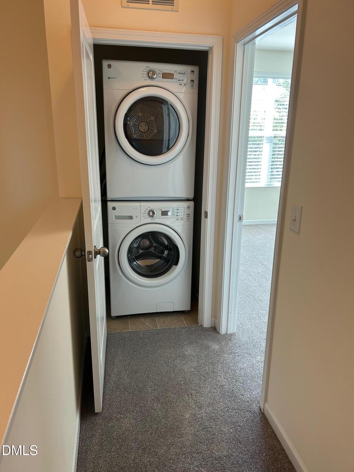4110 Sykes Street Cary, NC 27519 - Photo 28 of 29 a utility room with dryer and washer