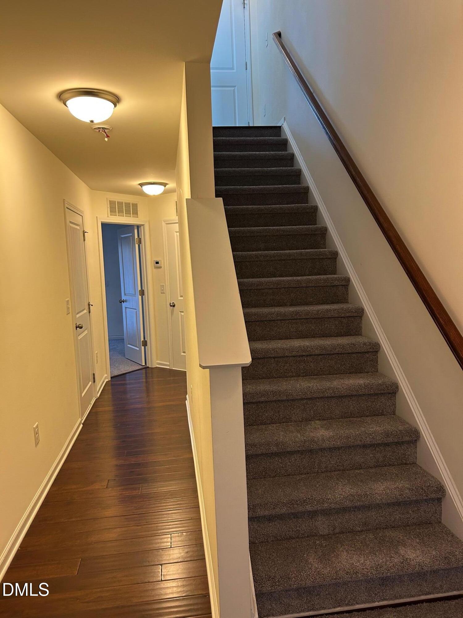 4110 Sykes Street Cary, NC 27519 - Photo 5 of 29 a view of entryway and hall with wooden floor