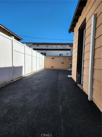 a kitchen with stainless steel appliances wooden cabinets and a sink