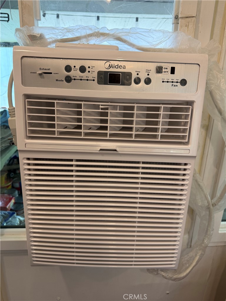 520 East Carson Street Carson, CA 90745 - Photo 9 of 16 New air conditioner in the living room
