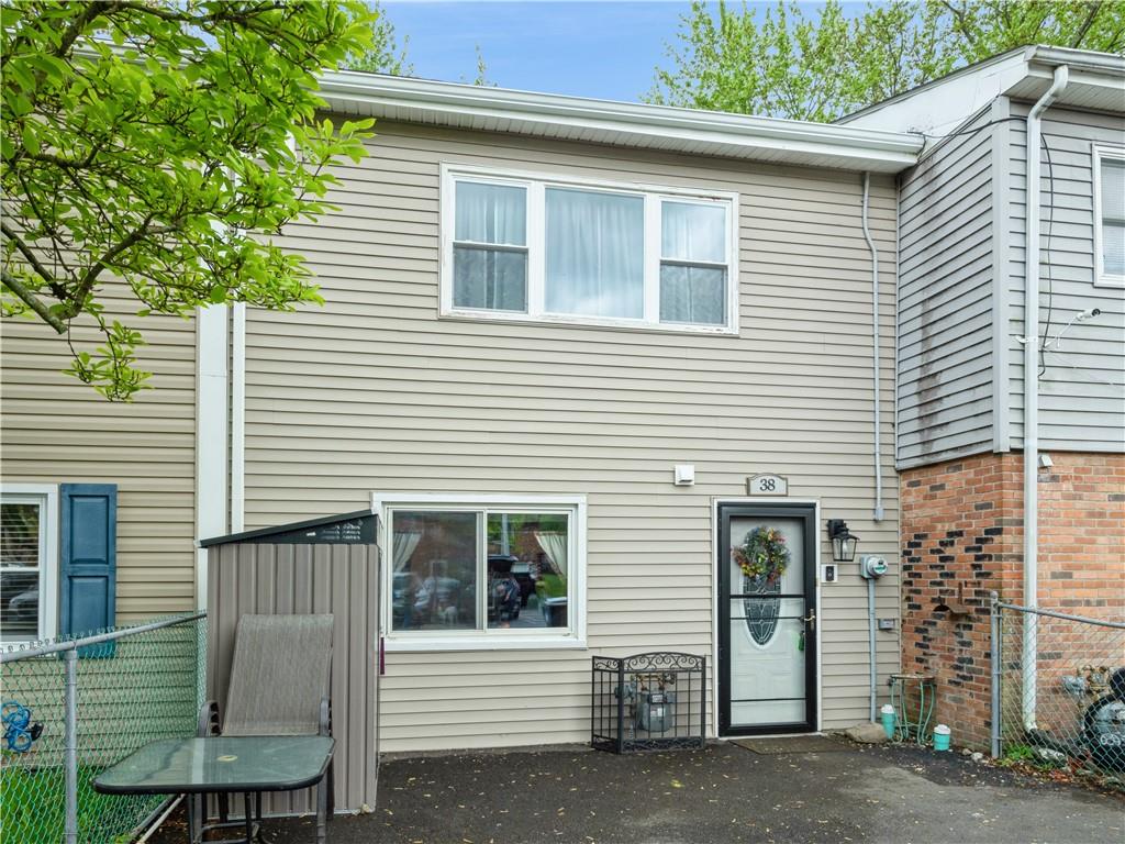 a view of a house with a yard and garage