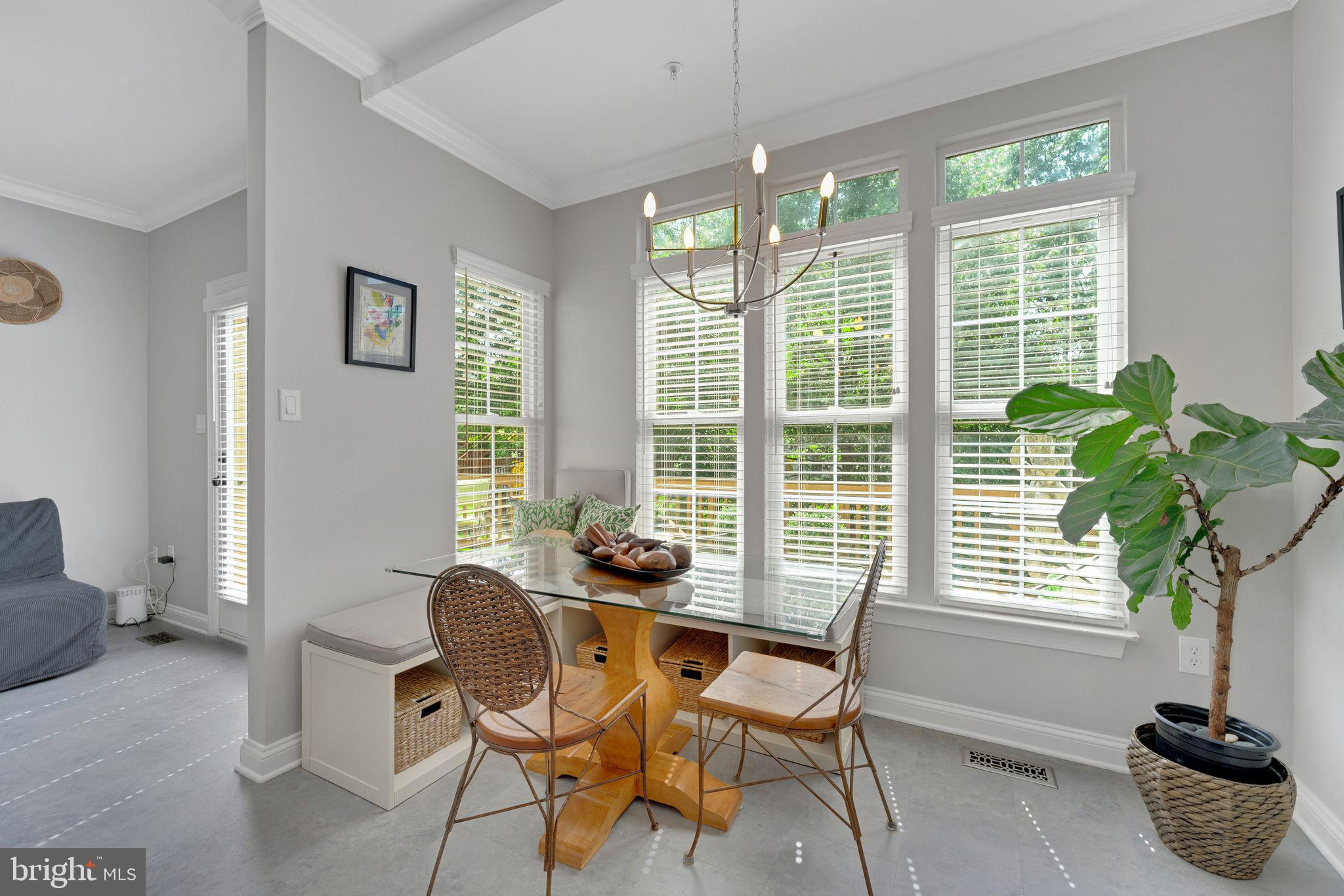 2116 Elm Tree Lane Silver Spring, MD 20906 - Photo 11 of 32 a dining room with furniture and windows