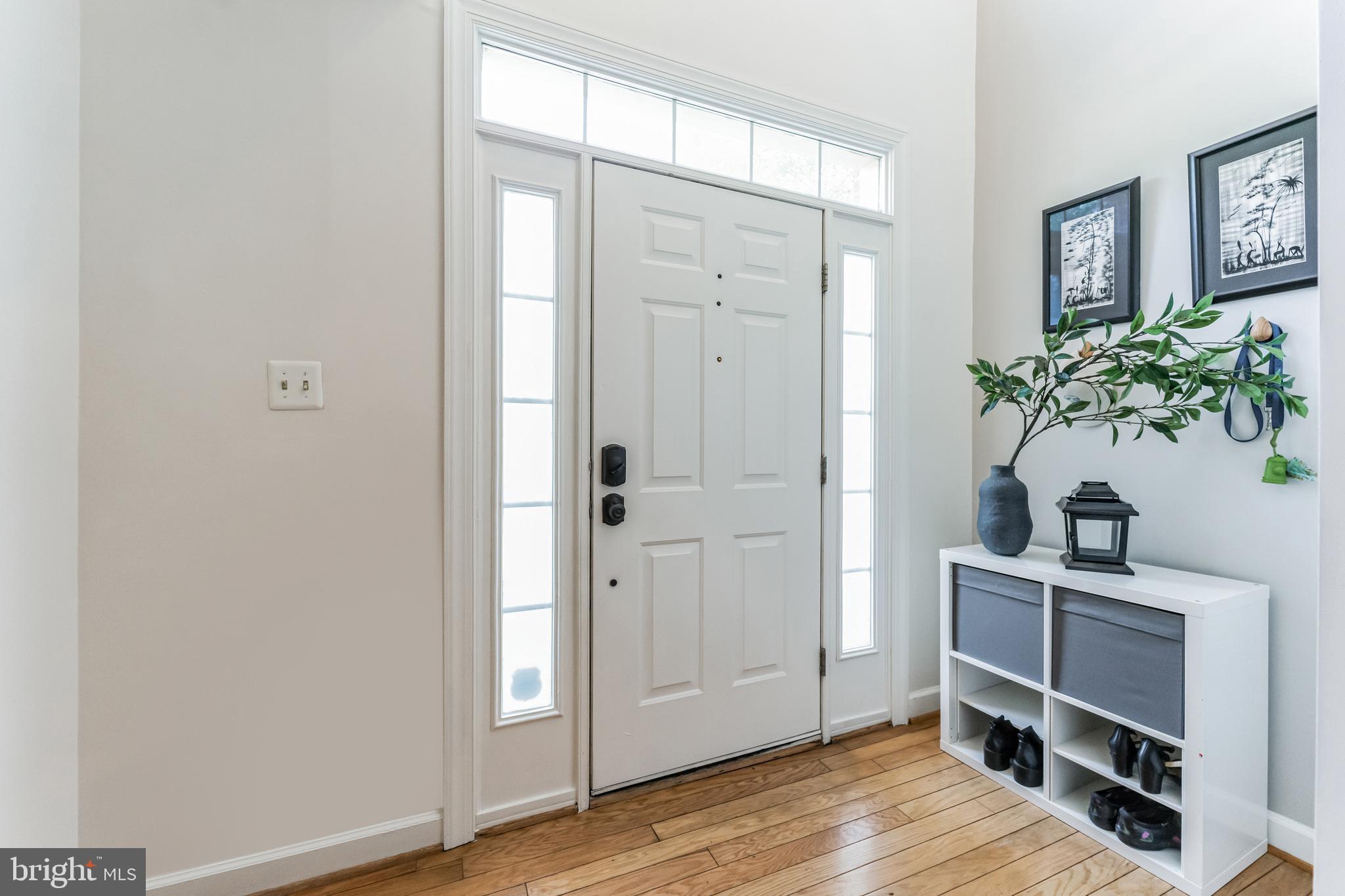 2116 Elm Tree Lane Silver Spring, MD 20906 - Photo 2 of 32 a view of a bedroom with wooden floor and closet