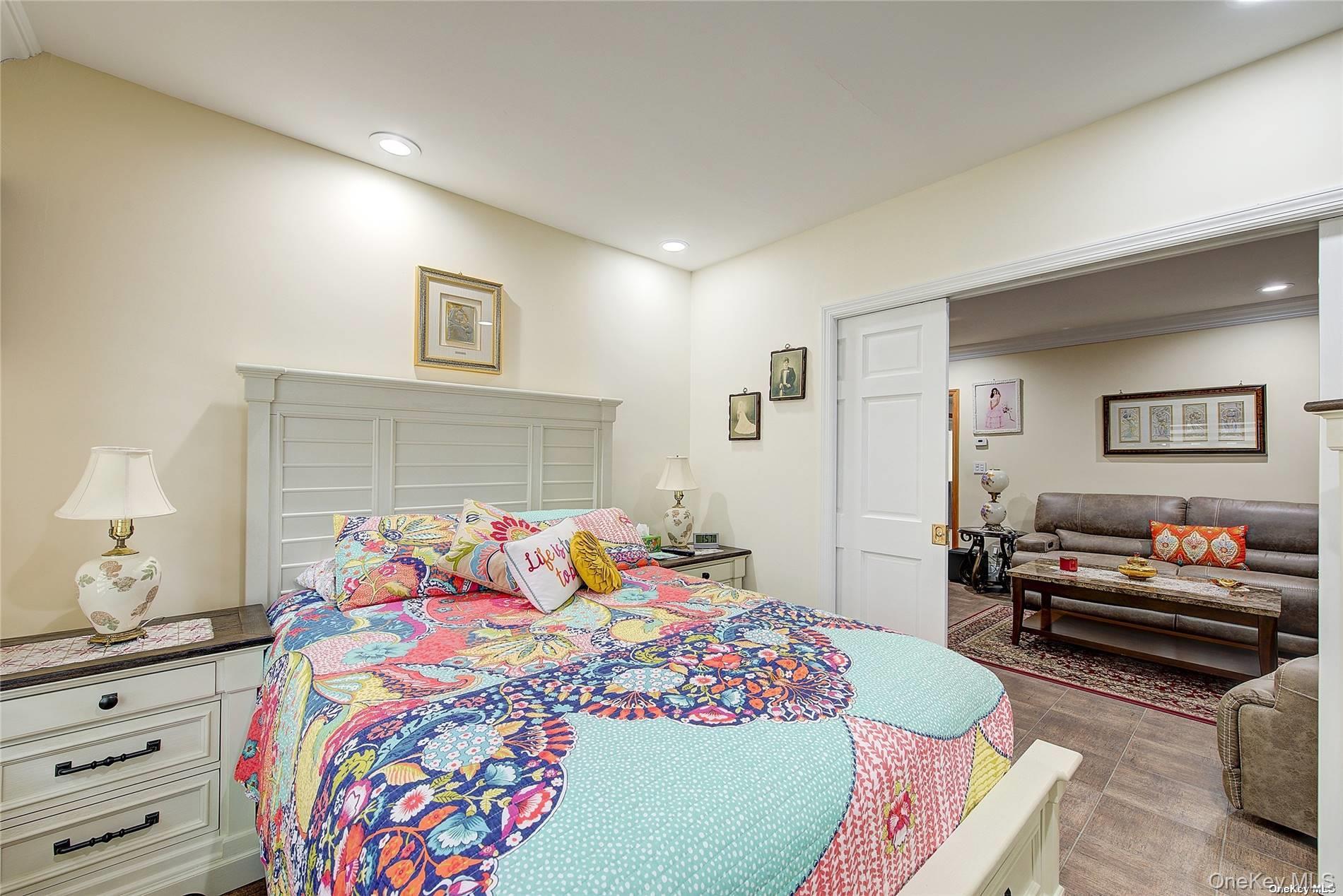 43-33 163rd Street Queens, NY 11358 - Photo 18 of 31 a bedroom with a bed and dresser