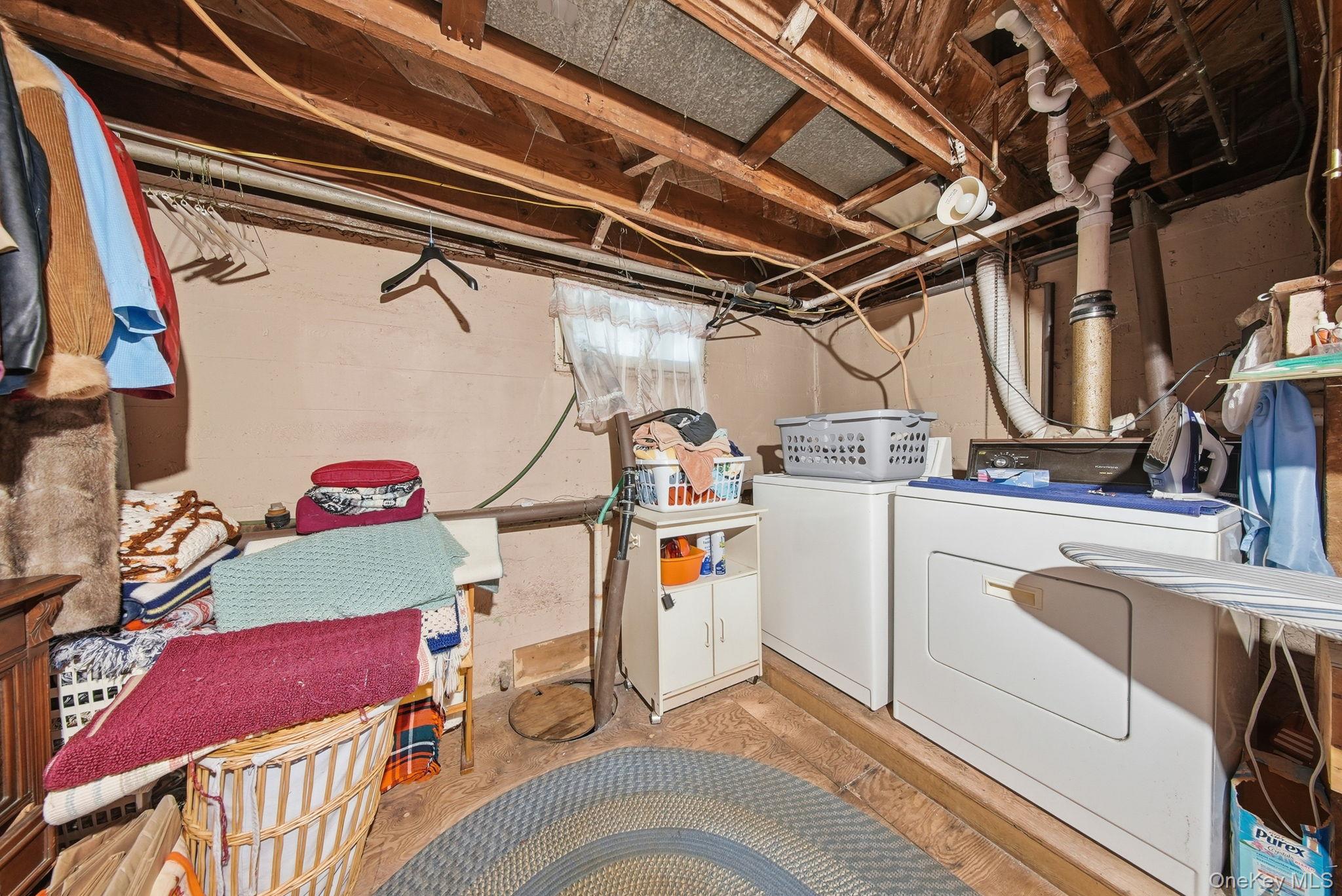 370 Starlight Road Monticello, NY 12701 - Photo 35 of 49 a utility room with dryer and washer
