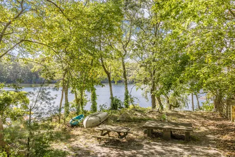 a backyard of a house with lots of green space