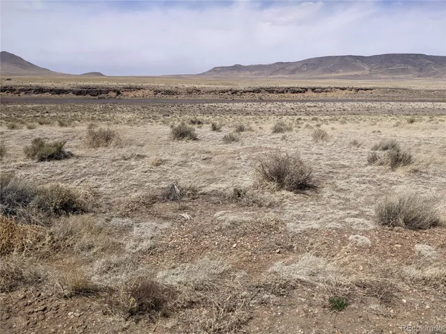a view of lake and mountain