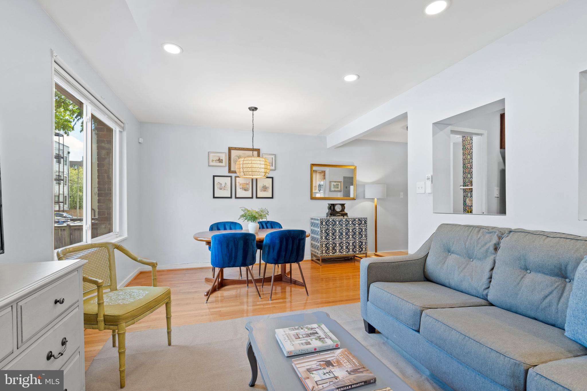 2639 15th Street Northwest, Unit 104 Washington, DC 20009 - Photo 13 of 36 a living room with furniture and a window