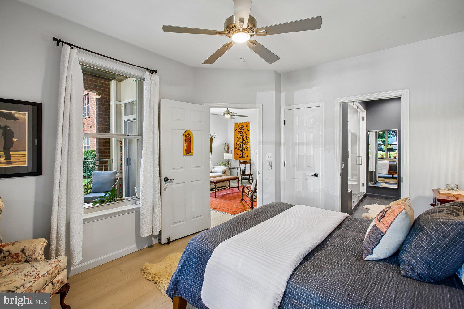 1855 Stratford Park Place, Unit 103 Reston, VA 20190 - Photo 21 of 49 Primary Bedroom with ceiling fan.
