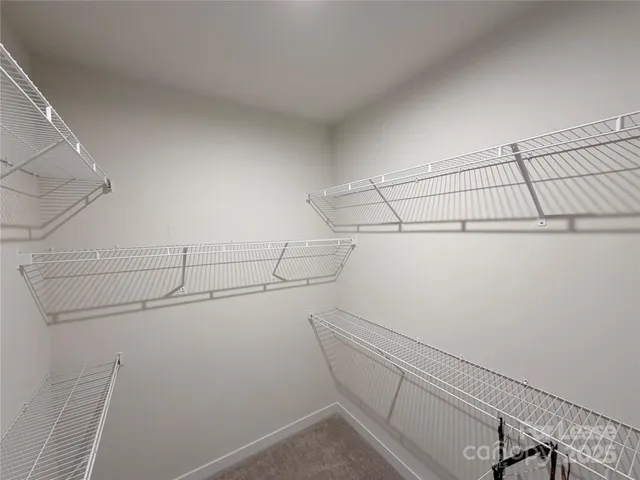 a view of a room with racks on the wall