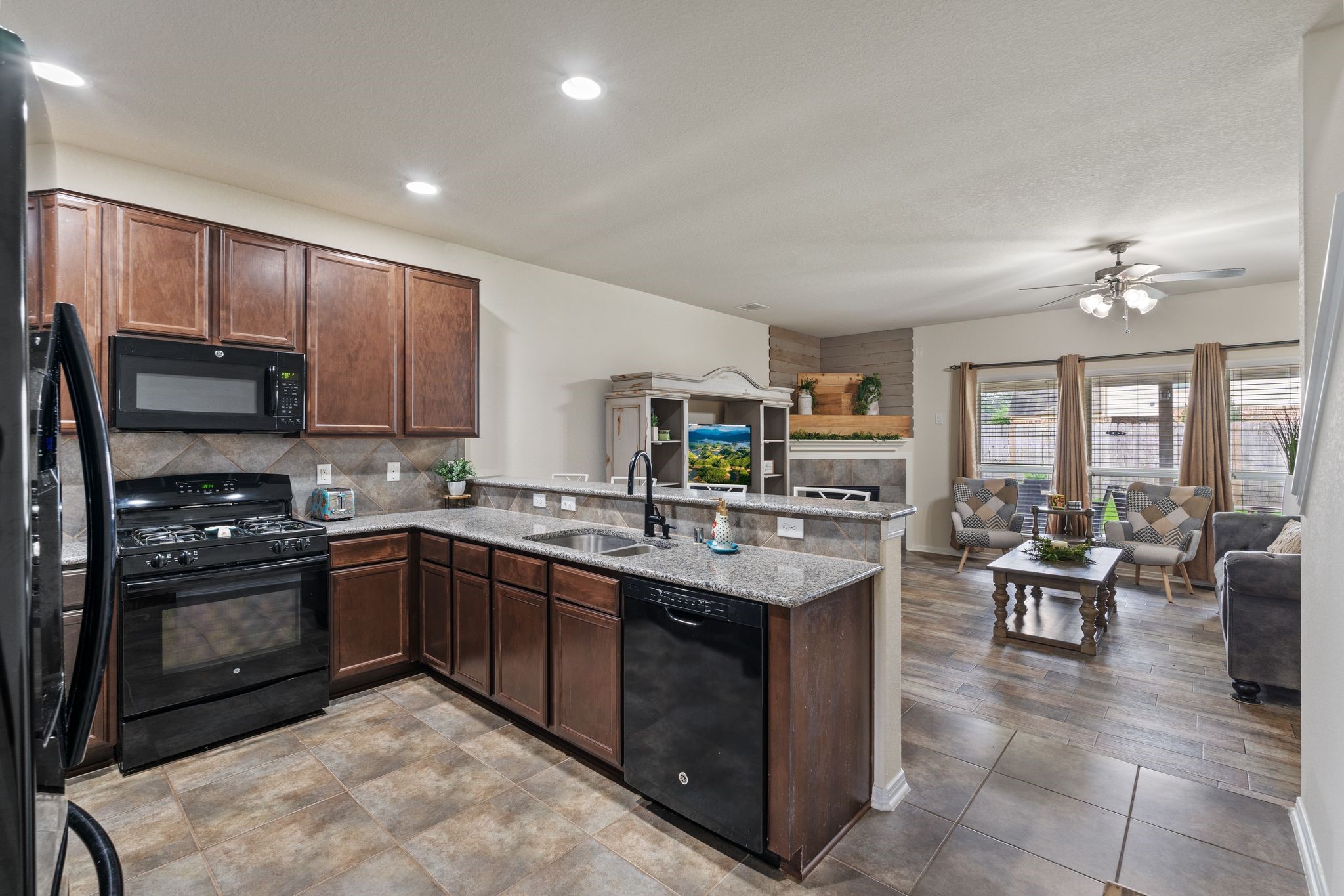 2678 Elm Crossing Trail Spring, TX 77386 - Photo 10 of 42 Nice open kitchen that overlooks the living room.