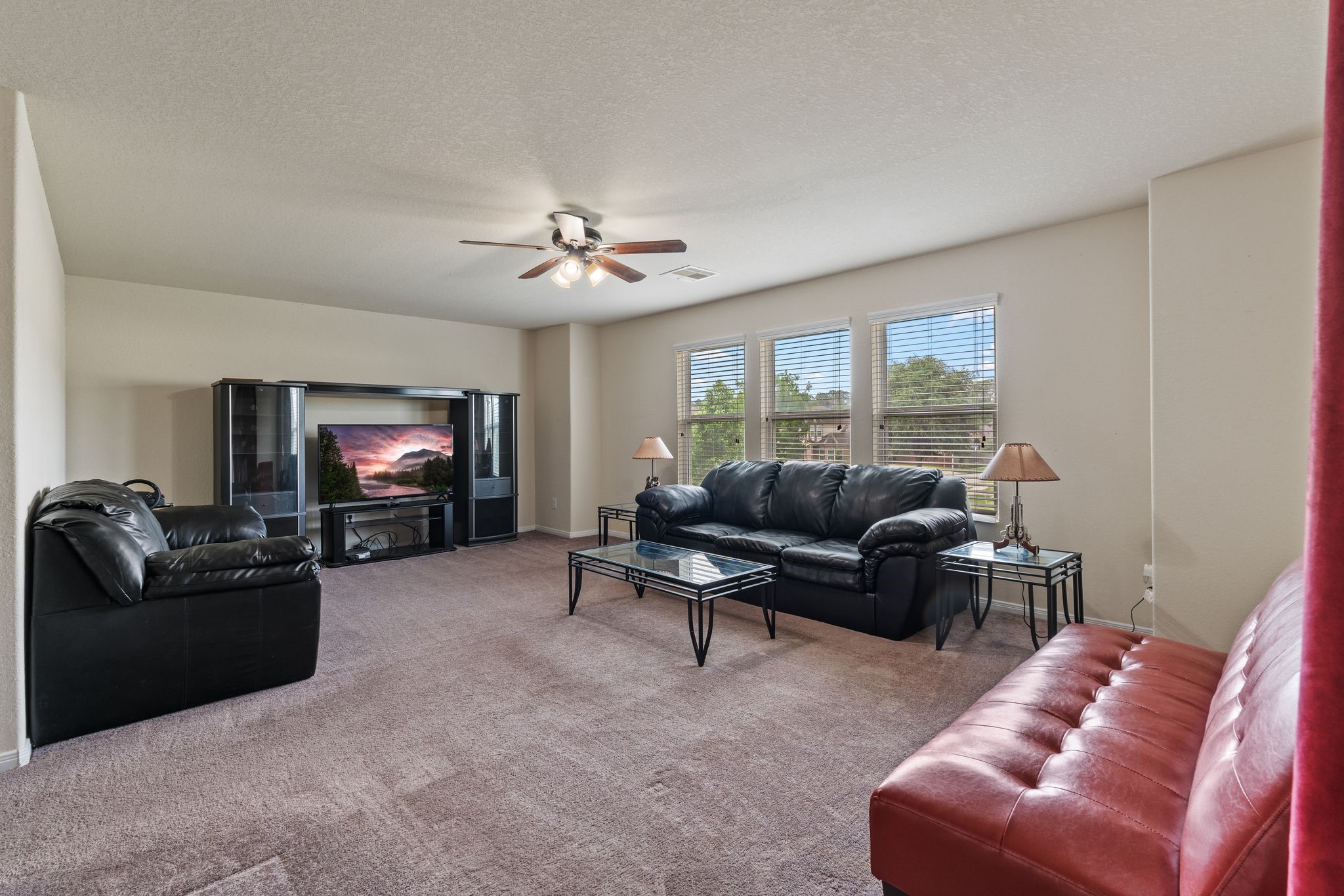 2678 Elm Crossing Trail Spring, TX 77386 - Photo 25 of 42 On the back portion of the upstairs is the huge game room that overlooks the back yard.