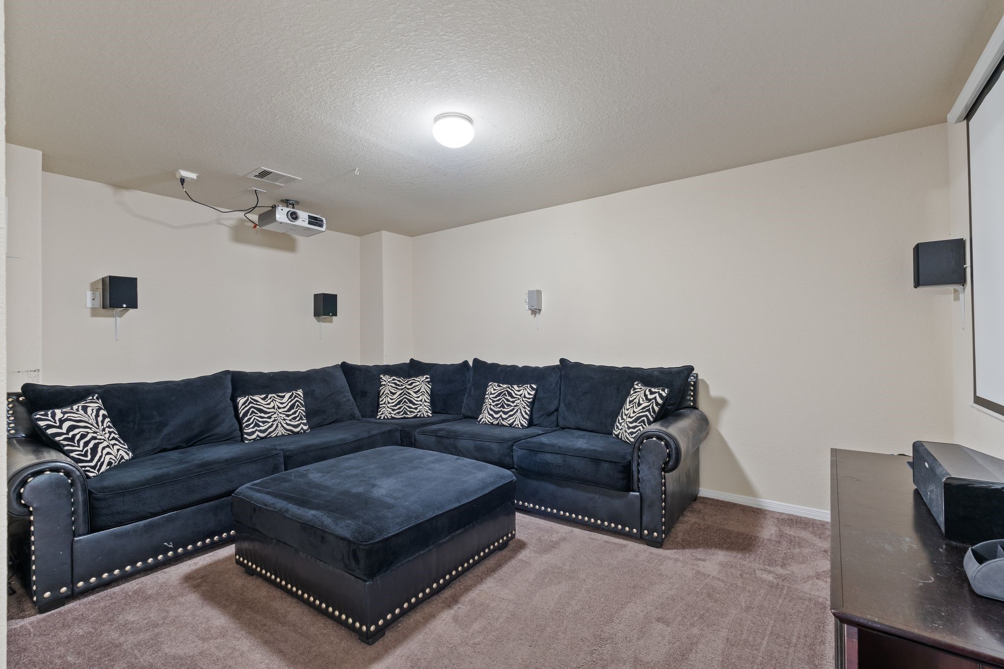 2678 Elm Crossing Trail Spring, TX 77386 - Photo 29 of 42 Just off the game room is the media room. Projector and screen are staying with the home!