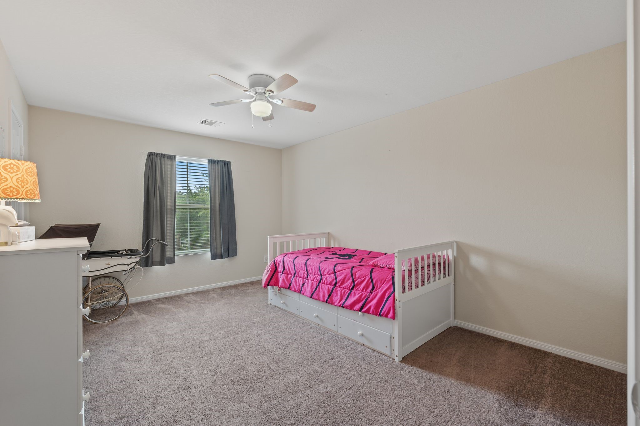 2678 Elm Crossing Trail Spring, TX 77386 - Photo 35 of 42 The 3rd of the secondary bedrooms overlooks the front driveway.