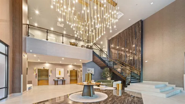 a view of a lobby with black carpet