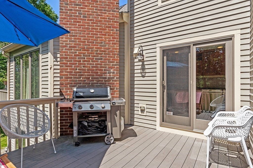 41 Quarry Ridge Lane, Unit 41 Rockport, MA 01966 - Photo 14 of 23 a view of a balcony and a lounge chair