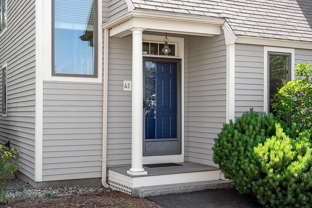 41 Quarry Ridge Lane, Unit 41 Rockport, MA 01966 - Photo 18 of 23 a view of a door of the house with an outdoor space
