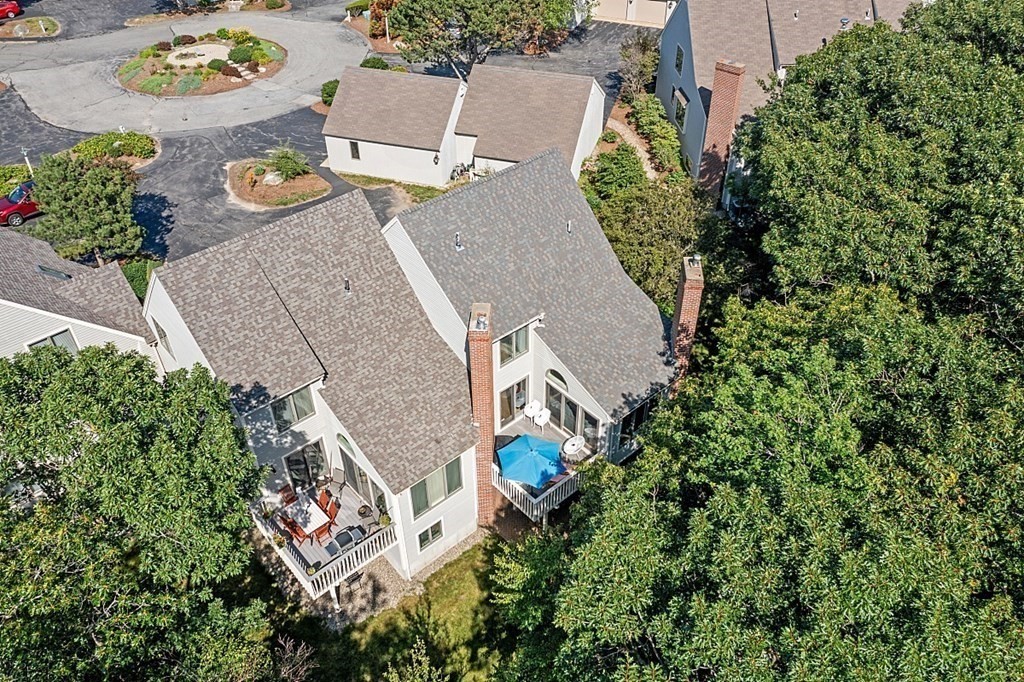 41 Quarry Ridge Lane, Unit 41 Rockport, MA 01966 - Photo 19 of 23 an aerial view of a house with outdoor space