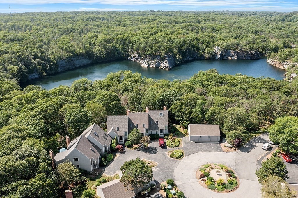41 Quarry Ridge Lane, Unit 41 Rockport, MA 01966 - Photo 22 of 23 an aerial view of a house with garden space and lake view