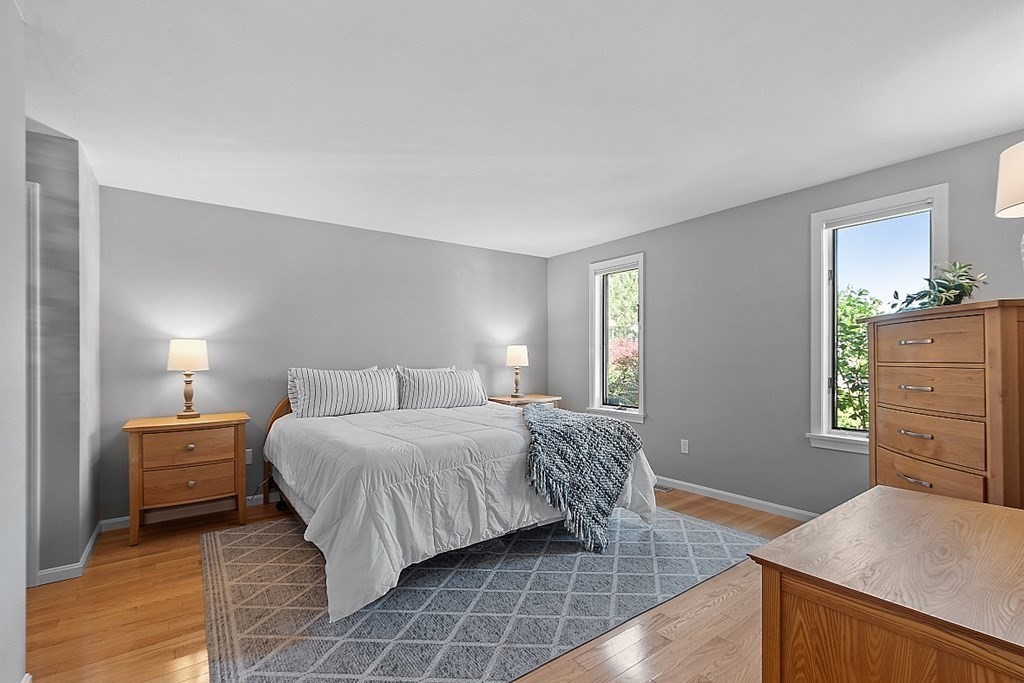 41 Quarry Ridge Lane, Unit 41 Rockport, MA 01966 - Photo 10 of 23 a bedroom with a bed and a dresser