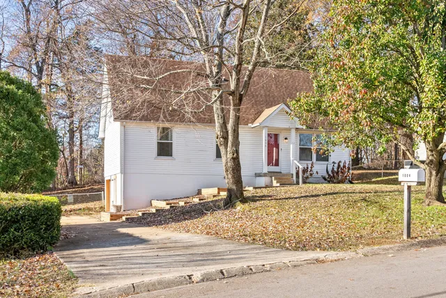 front view of house with a trees