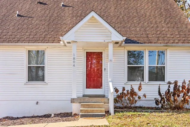 a front view of a house with patio