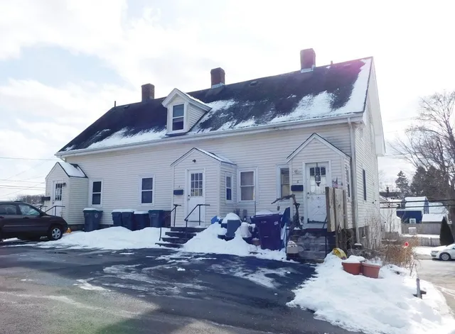 a view of a house with a patio